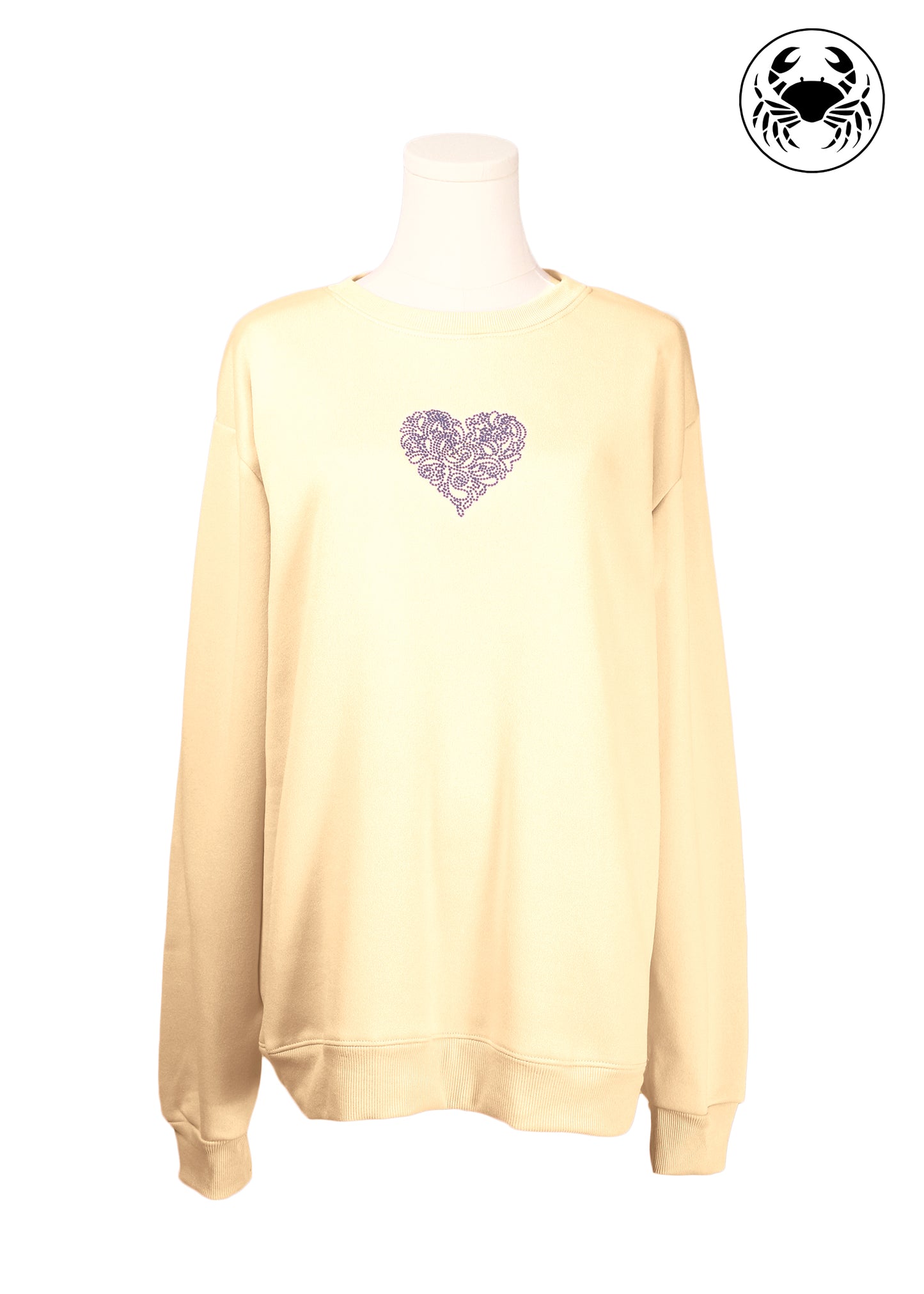 Front view of Beige unisex crewneck sweatshirt featuring a delicate embroidered heart design on the chest, long sleeves, ribbed cuffs and hem