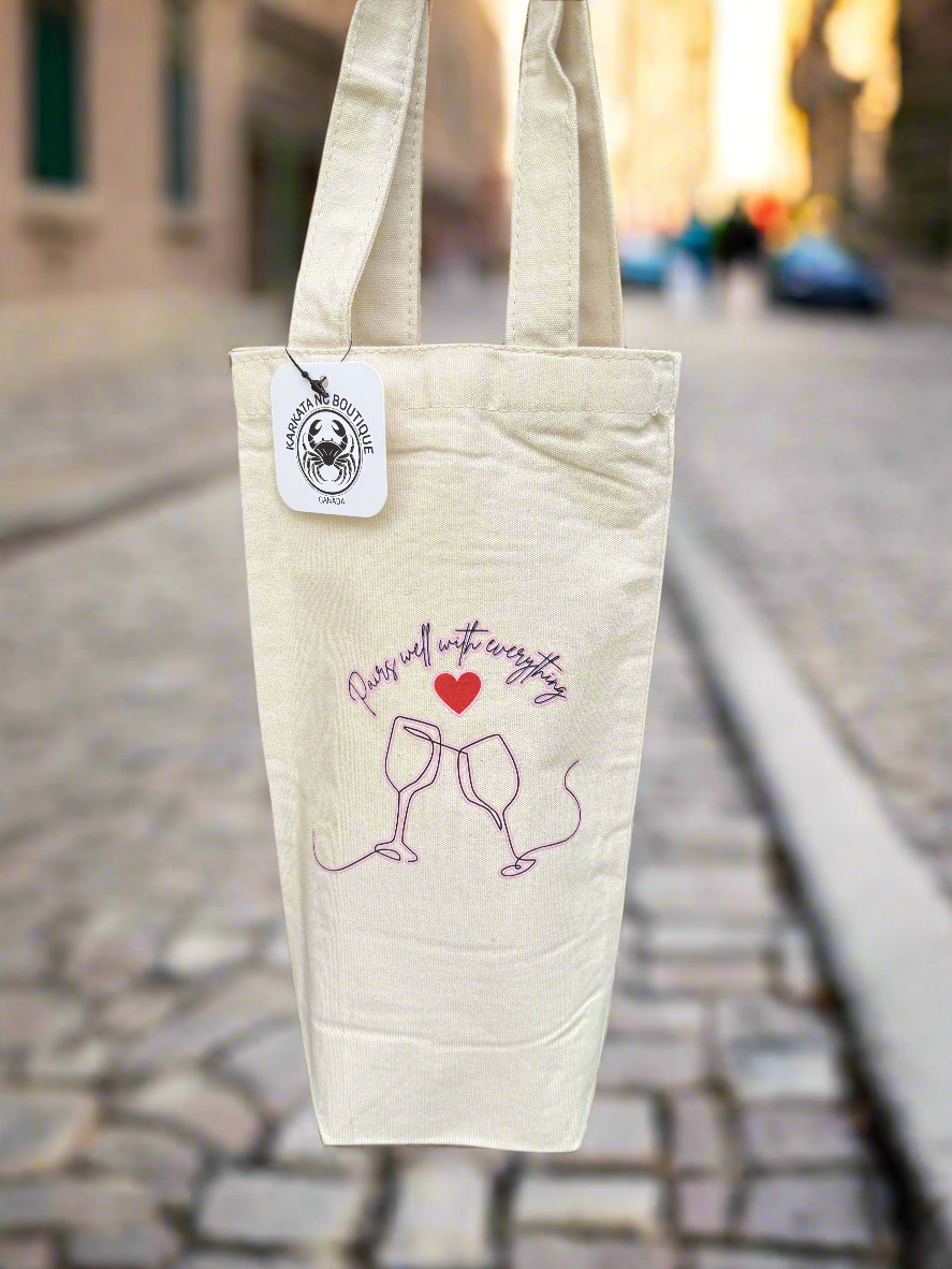 Canvas wine bag with the quote "Pairs well with everything" printed in bold black text, designed by Karkata NC Boutique.