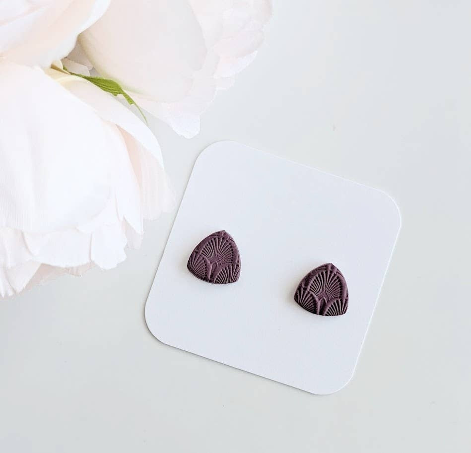 Pair of Purple Textured Stud Earrings, featuring handmade triangular polymer clay studs with intricate art deco patterns