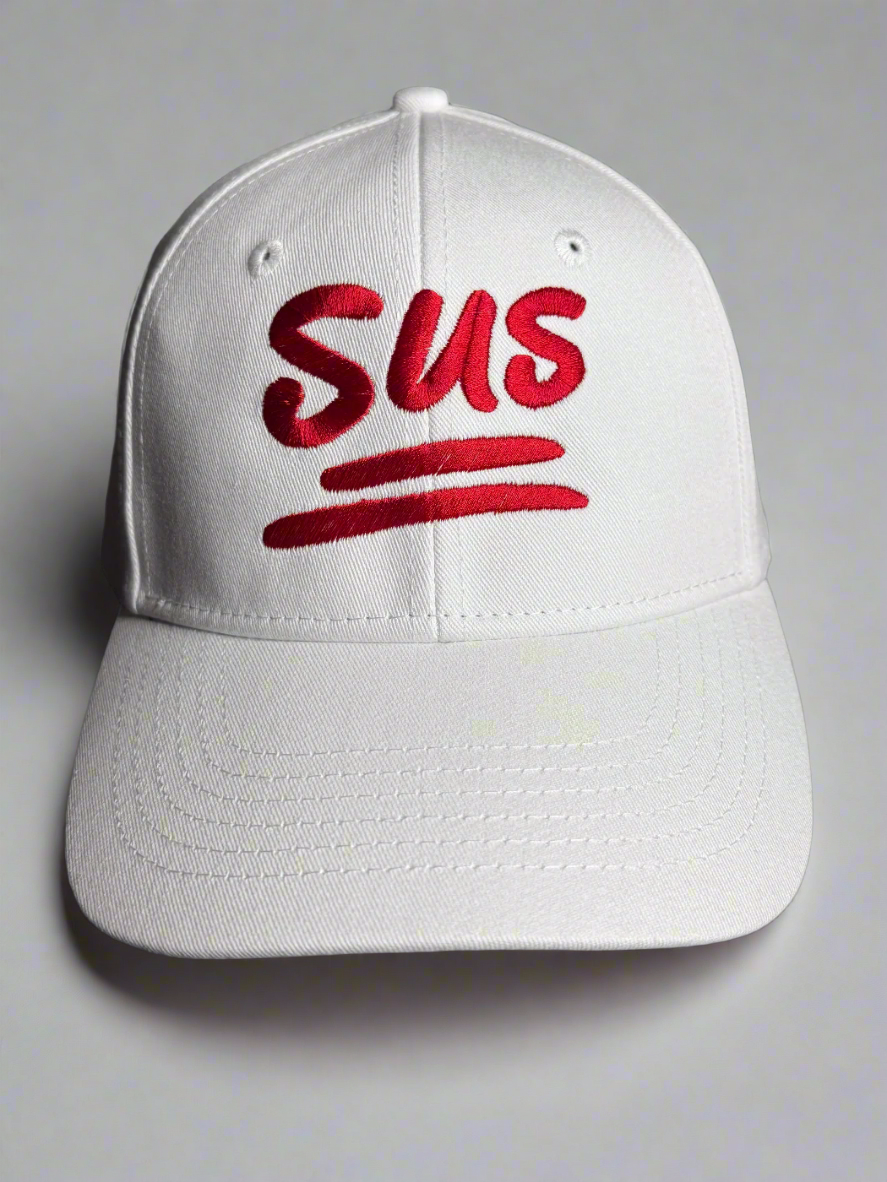 White baseball cap with bold red "SUS" embroidery and double underline on the front.