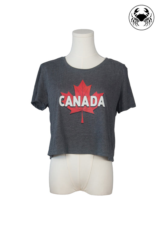 Front view of women’s grey crop top with bold red maple leaf and “CANADA” graphic