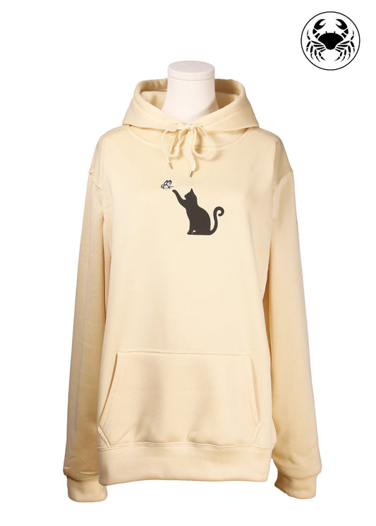 front view Unisex light beige hoodie with a front kangaroo pocket, drawstring hood, and an embroidered chest design featuring a Cat Caught in a Moment with Butterfly