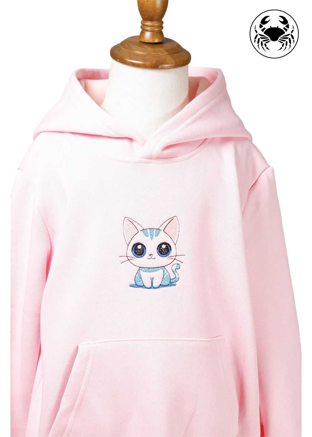 Front focus view of light pink hoodie for kids with embroidered cute kitty design, Canadian apparel
