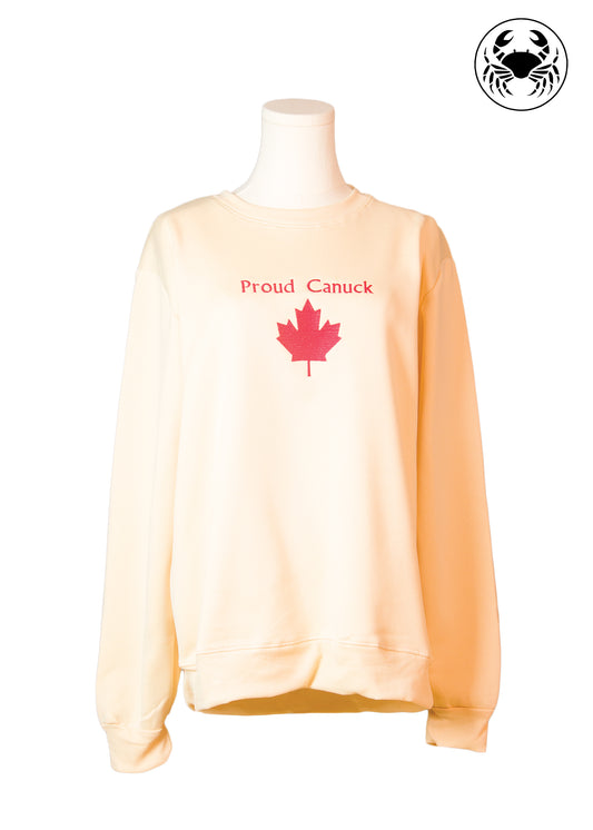 Front view of beige sweatshirt with maple leaf and “Proud Canuck” embroidery, Canadian apparel