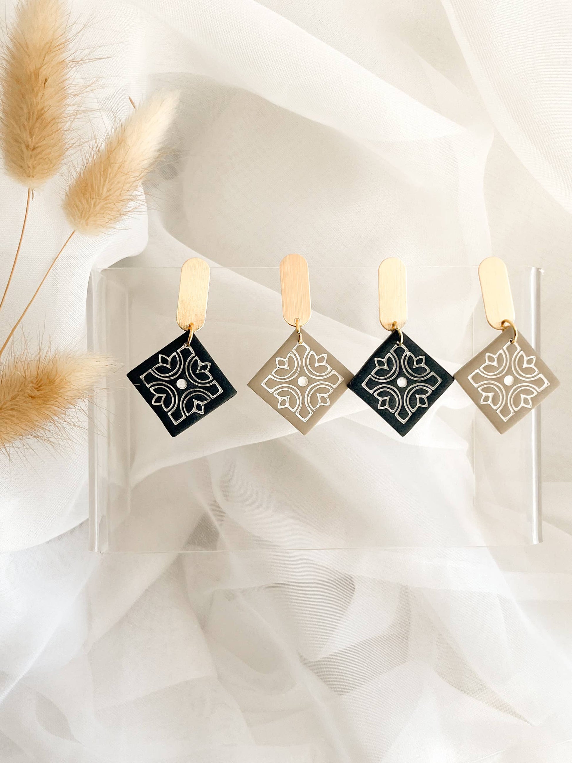 Boho-style polymer clay statement earrings, handcrafted design, comfortable and perfect for sensitive ears.