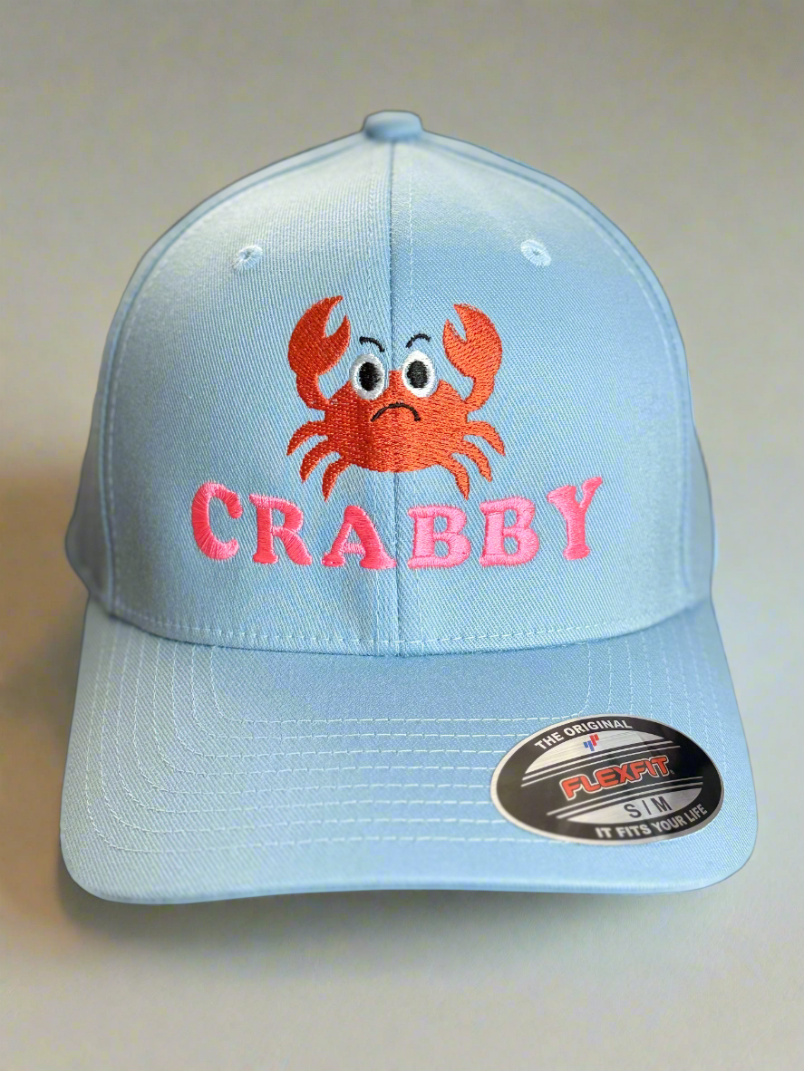 Light blue structured Flexfit hat with embroidered red crab and CRABBY text on front