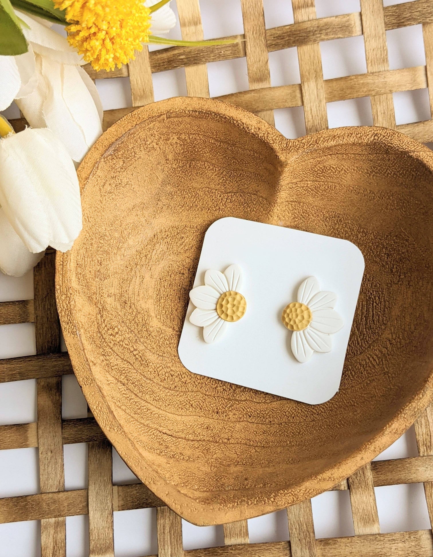 Pair of Daisy Large Clay Stud Earrings, featuring handmade white daisy flower studs with textured yellow centers