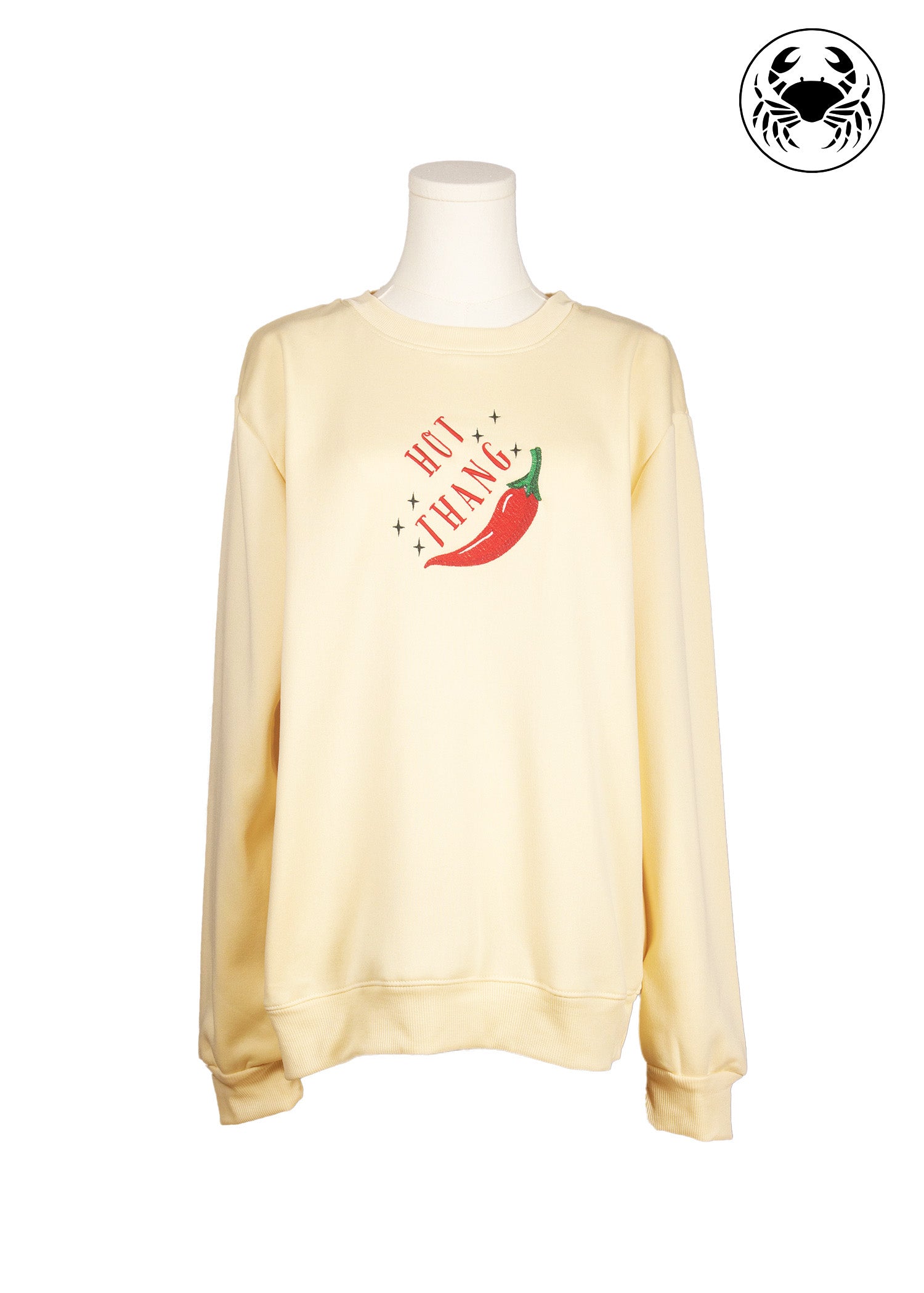 Front view of beige sweatshirt with red chili and “Hot Thang” embroidered design, Canadian apparel