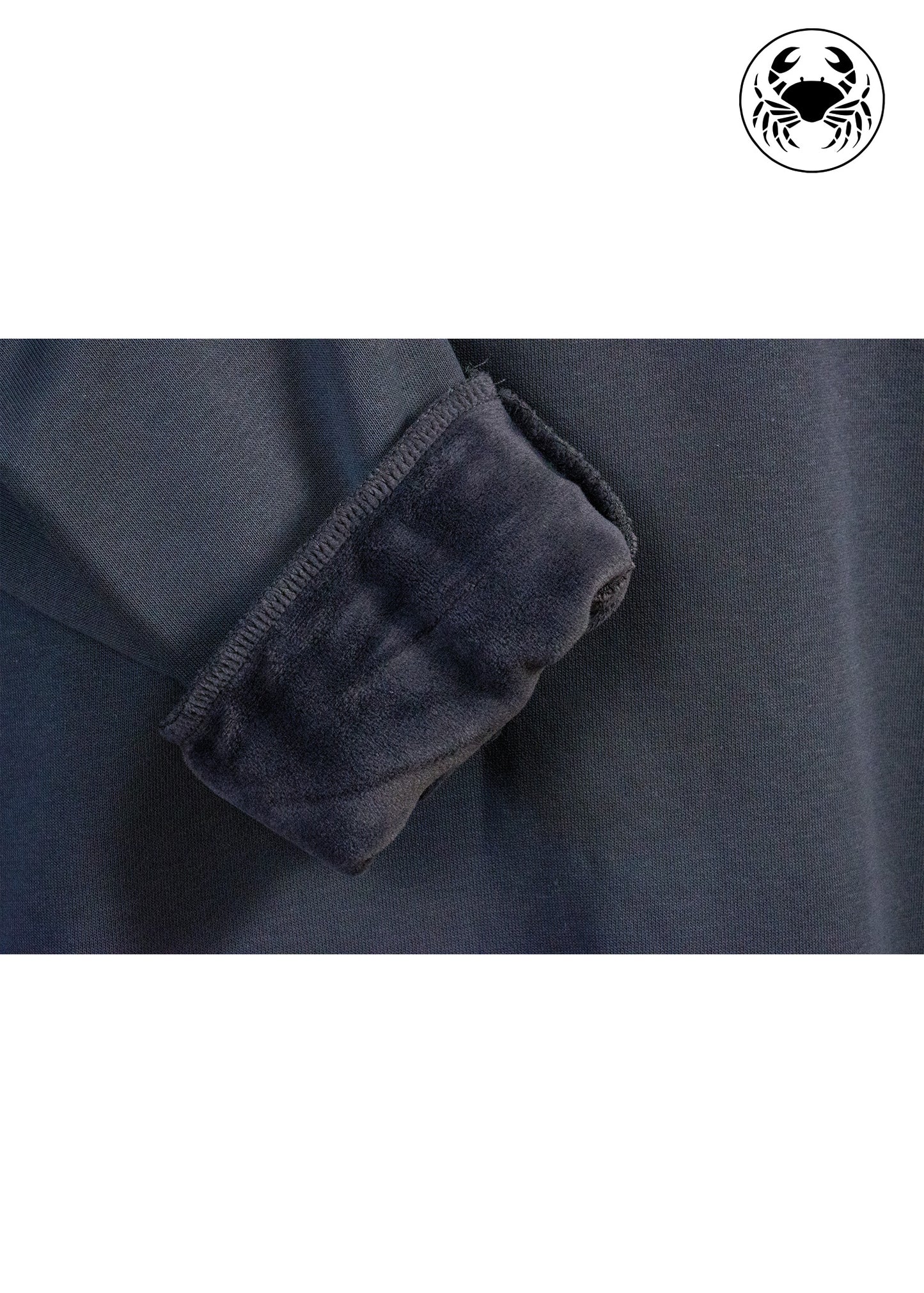 Closeup view of fabric of grey sweatshirt with 3D puff "CANADA"  Embroidery on fall maple leaf 