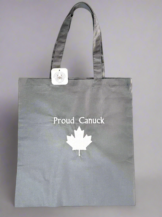 Grey embroidered tote bag with ‘Proud Canuck’ text and a white maple leaf design
