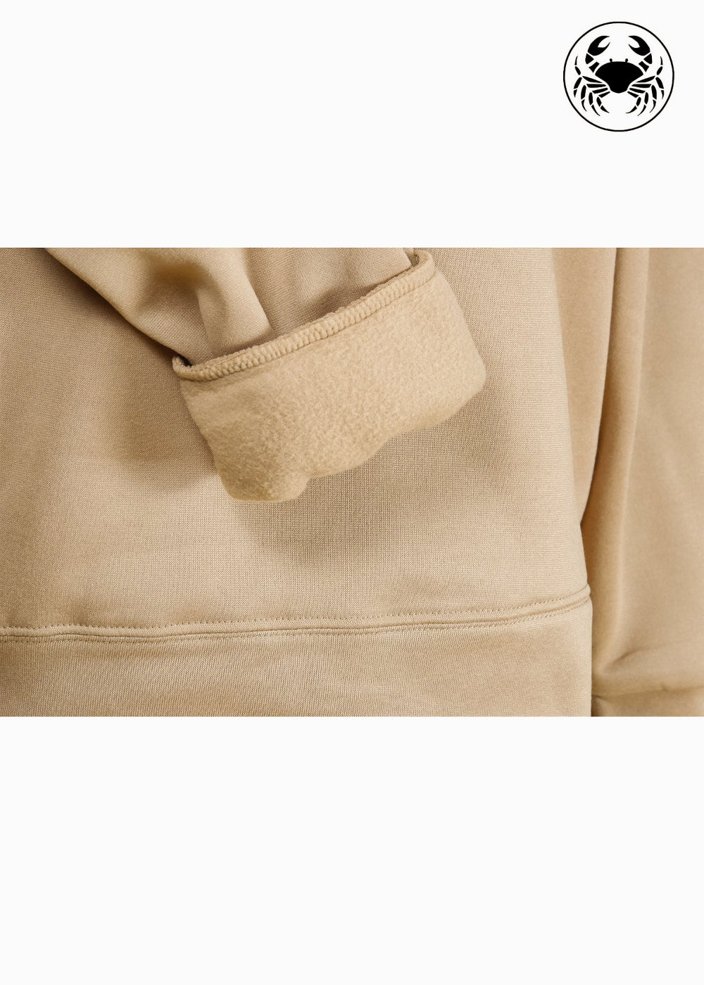 close up view of fleece fabric of Unisex camel brown hoodie with a soft fleece texture, front kangaroo pocket, drawstring hood, and an embroidered chest design featuring a white horse