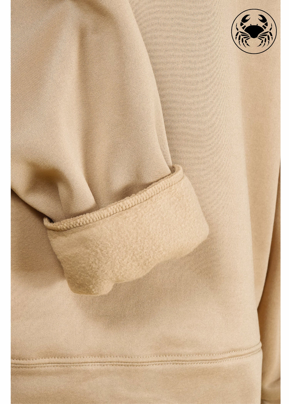 view of fleece fabric of Unisex camel brown hoodie with a soft fleece texture, front kangaroo pocket, drawstring hood, and an embroidered chest design featuring a white horse