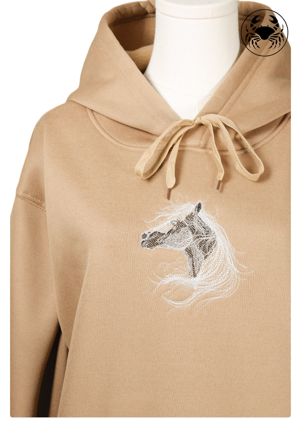 Unisex camel brown hoodie with a soft fleece texture, front kangaroo pocket, drawstring hood, and an embroidered chest design featuring a white horse