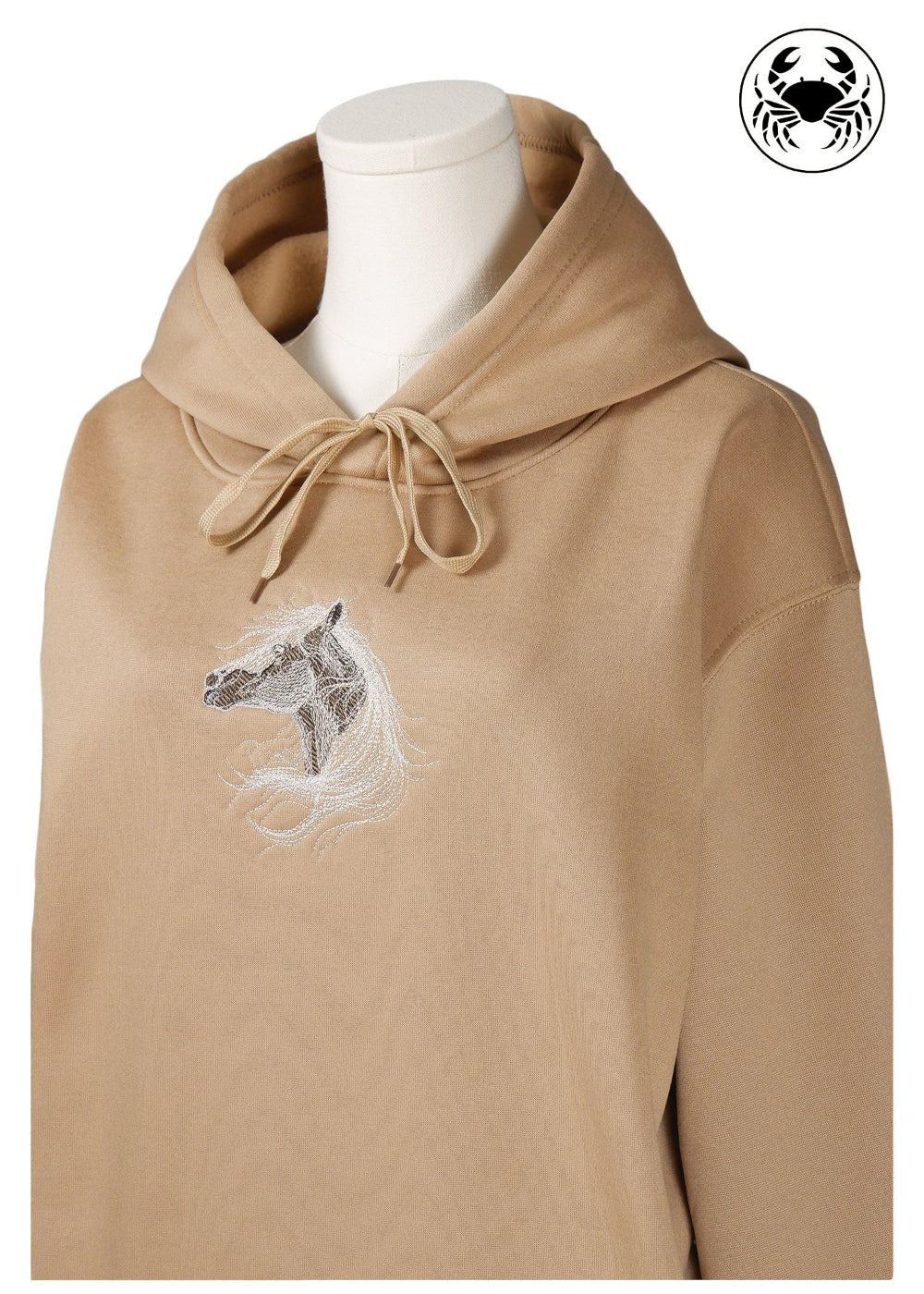 Front tilted view of Unisex camel brown hoodie with a soft fleece texture, front kangaroo pocket, drawstring hood, and an embroidered chest design featuring a horse