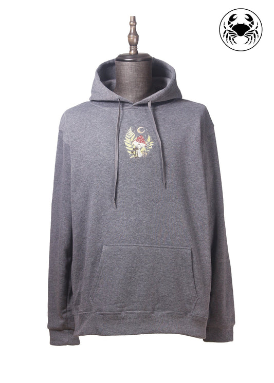 Front view of Unisex charcoal gray fleece hoodie with a front kangaroo pocket, drawstring hood, and a chest graphic featuring a mushroom and botanical leaves