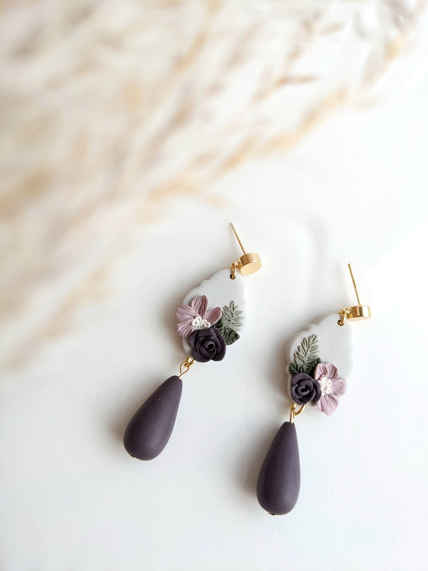 Handmade polymer clay earrings with hypoallergenic stainless steel posts, lightweight and comfortable for sensitive ears, crafted in Canada.