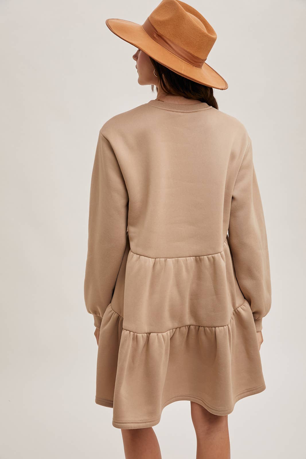 Karkata NC Boutique beige tiered sweatshirt knit dress back view