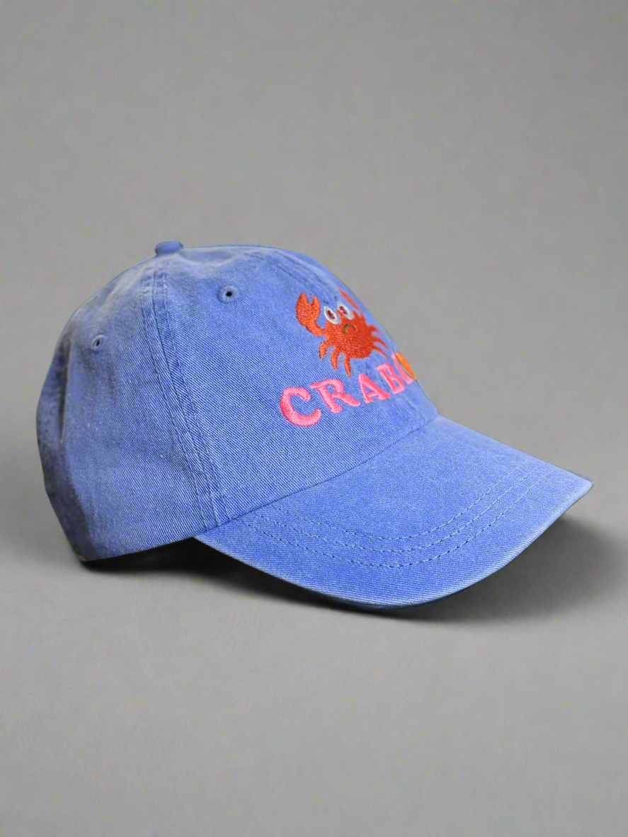 Washed navy cap with cartoon crab and CRABBY text embroidered